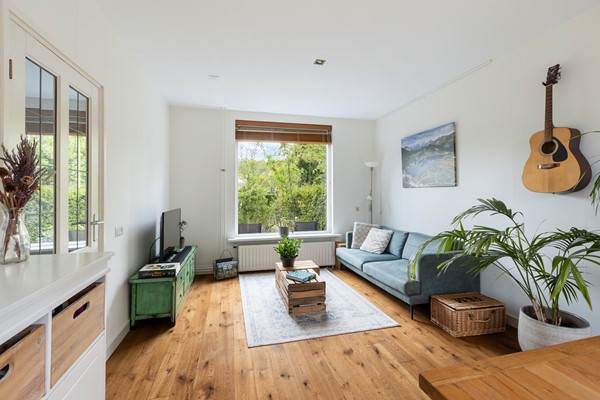 Foto - Te koop: Sfeervolle tussenwoning met groene oase!